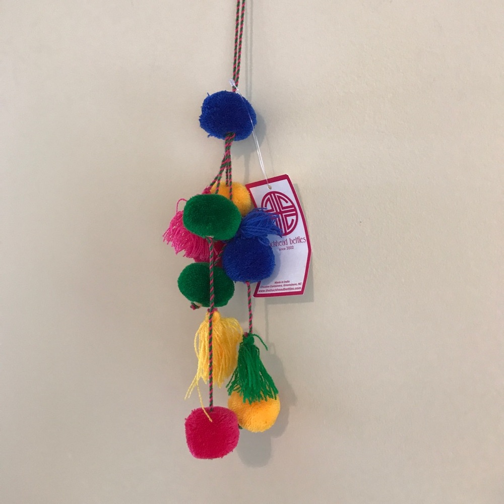 Tassel and pom-pom combination multicolored